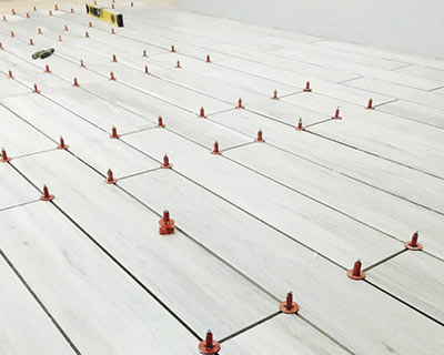 The ATR Tile Leveling system minimises tile lippage in the offset pattern tile installation